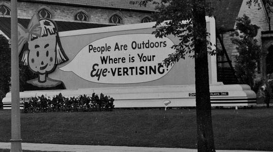 A billboard advertising billboards, Milwaukee, around 1939.