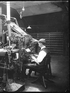 A Linotype operator at his keyboard, around 1903.