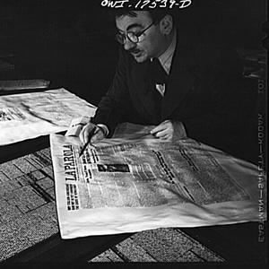 An editor correcting a proof, New York, 1943.